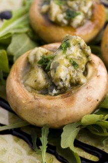 Delicious stuffed mushrooms with cheese and pesto