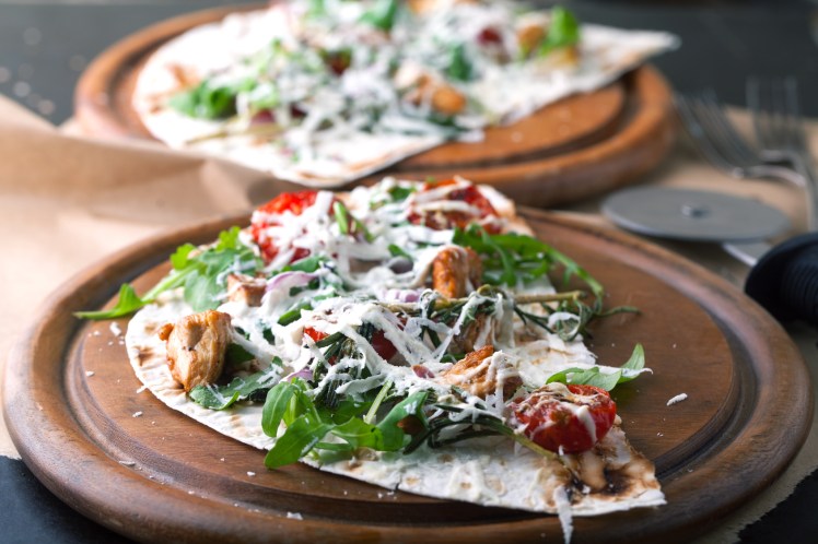 Pita bread with roasted vegetables and cheese