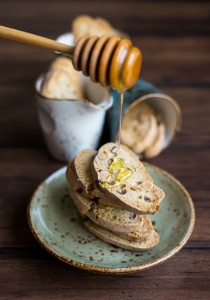 Traditional homemade italian cantucci or cantuccini cookies with almond nuts and honey
