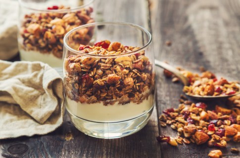 Homemade granola, muesli with yogurt in glasses